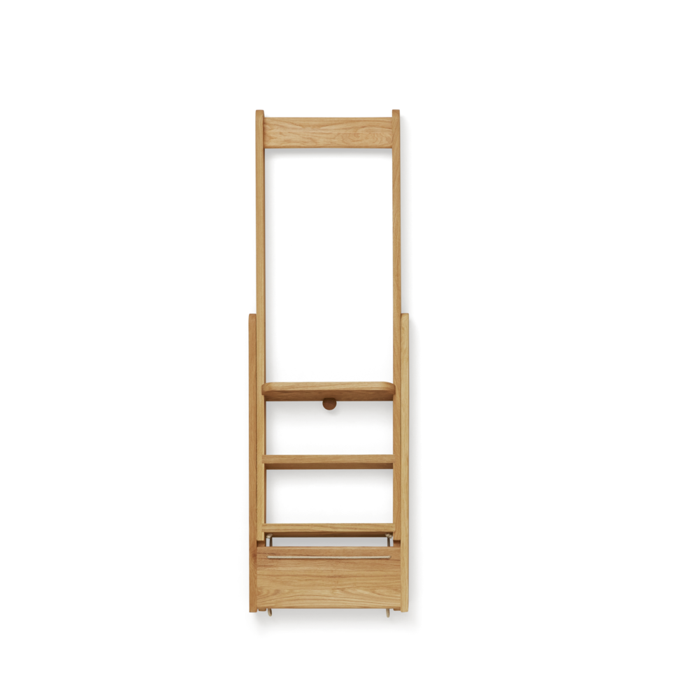 A "Step by Step Ladder" by Form & Refine, a decorative object with a natural oak foldable ladder against a black background.