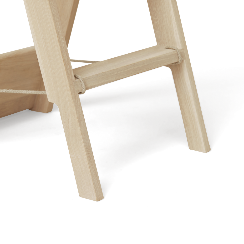 A STEP BY STEP LADDER with a natural oak base by FORM & REFINE.
