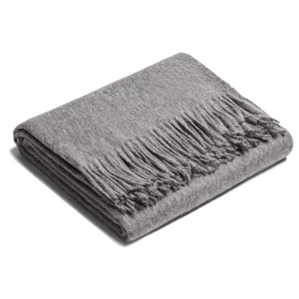 A SIBAST ALPACA THROW with fringes on it sold at Gestalt Haus.