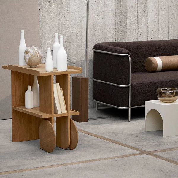 A living room with an AXIS SIDE TABLE by KRISTINA DAM STUDIO amidst the Gestalt Haus aesthetic.