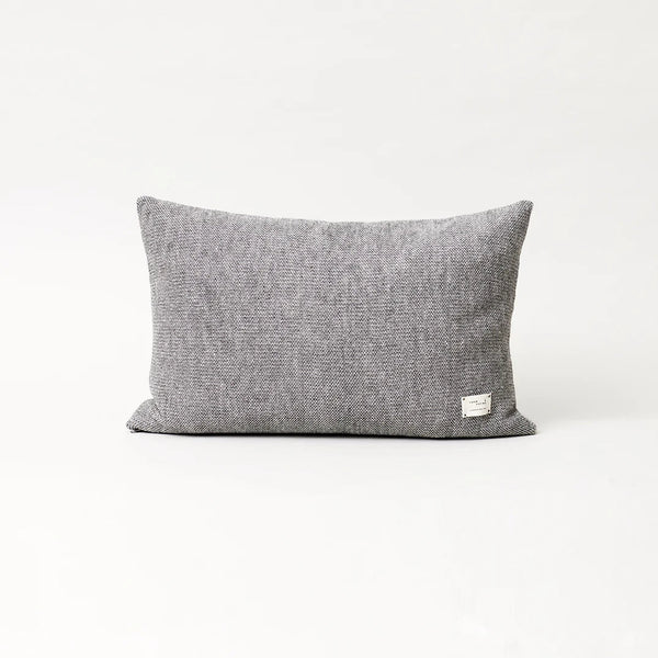 An AYMARA LONG CUSHION by FORM & REFINE featured in the Gestalt Haus collection on a white background.