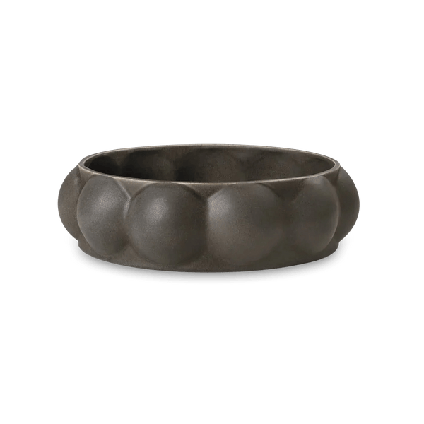 A black bowl with a ring on it from LOUISE ROE.