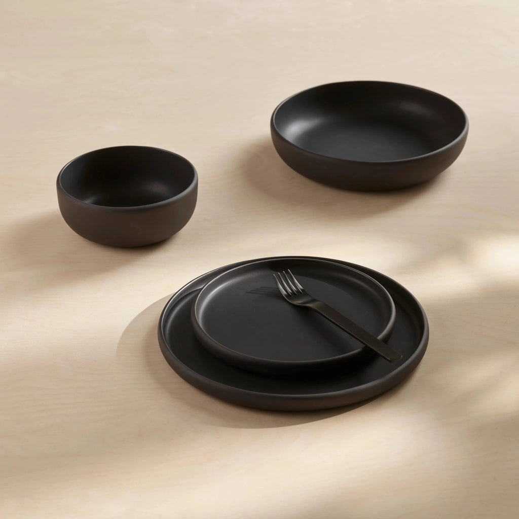 A set of COLOMBO TABLEWARE on a table, designed by AARON PROBYN for Gestalt Haus.