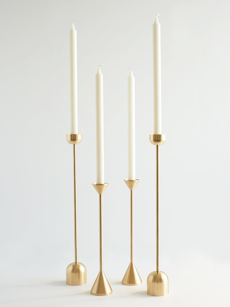 Three Gestalt Haus DOME SPINDLE CANDLE HOLDERS by FS OBJECTS on a white surface.