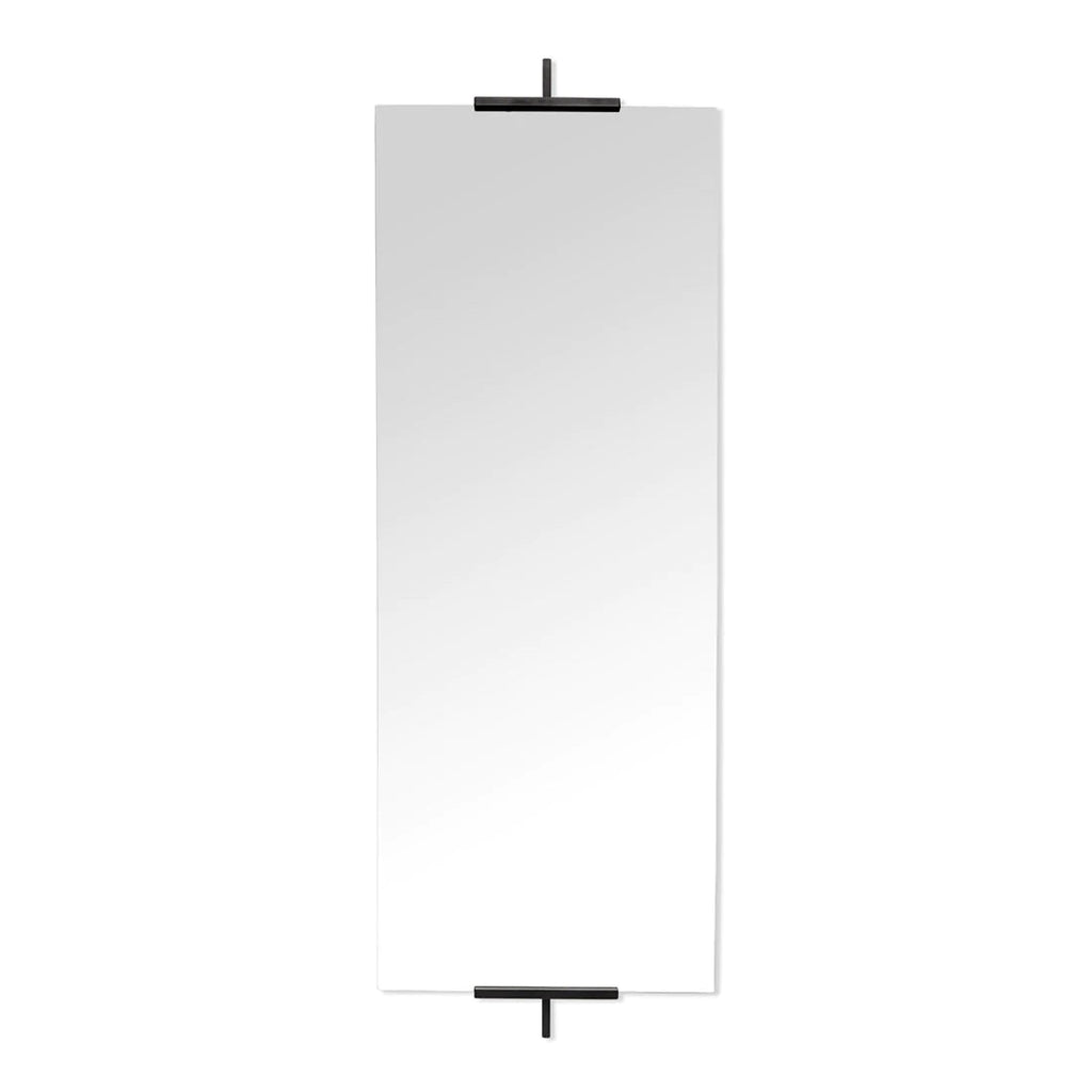 A Kristina Dam Studio easel mirror with a black frame on a white background at Gestalt Haus.