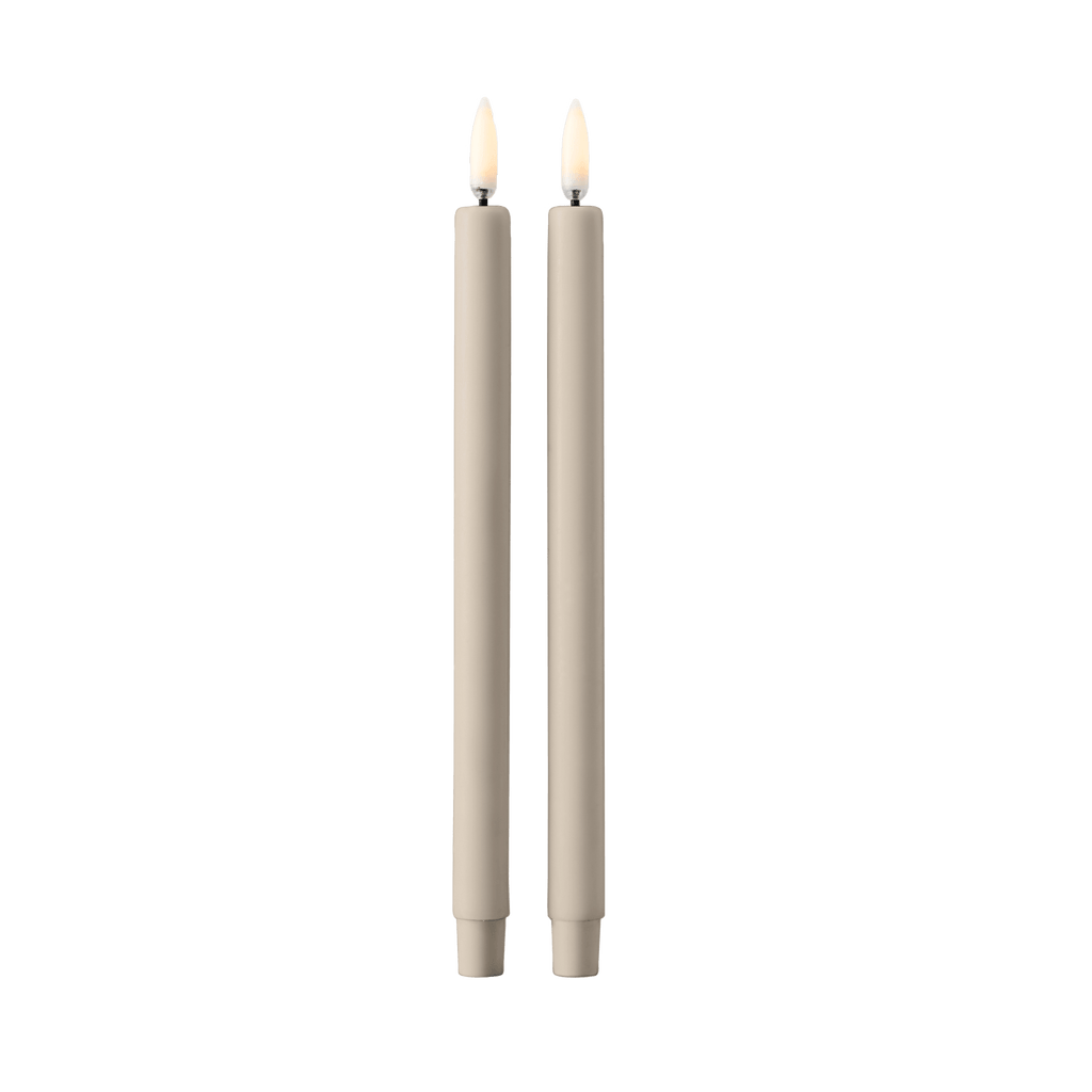 Two STOFF NAGEL LED candles on a white background, displayed in a Gestalt Haus setting.