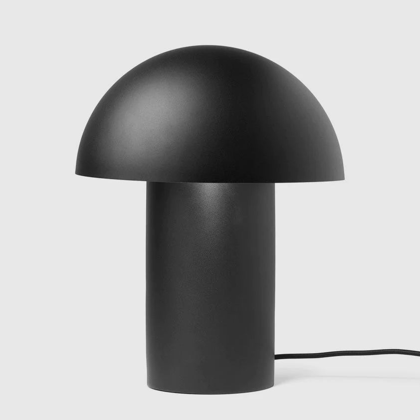 A LEERY Gestalt Haus TABLE LAMP by GEJST on a white surface.