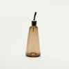 An OLIVE OIL CRUET by GARY BODKER DESIGNS with a Gestalt Haus vibe on a white background.