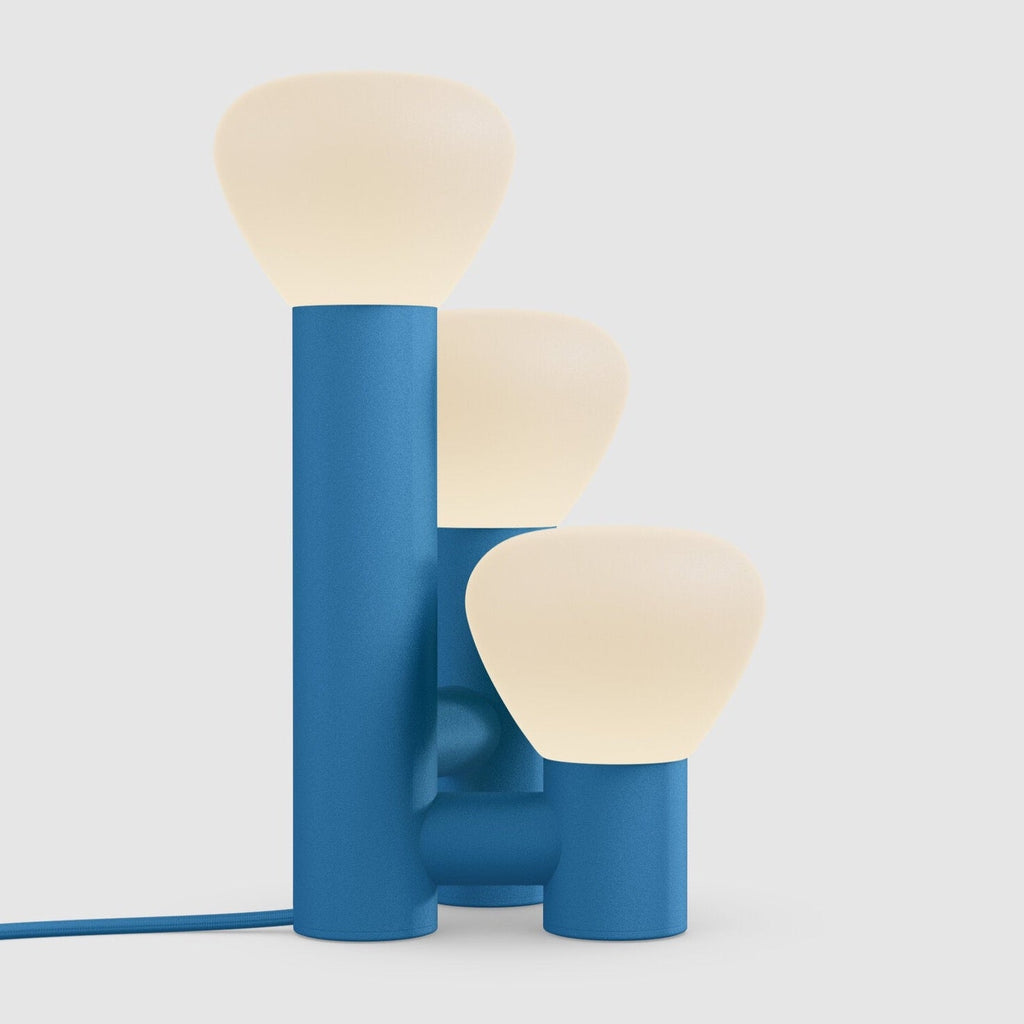 A PARC 06 TABLE LAMP by LAMBERT ET FILS with a Gestalt Haus design and three lights on it.