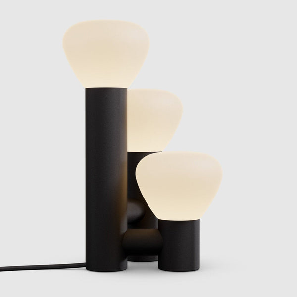 A PARC 06 TABLE LAMP by LAMBERT ET FILS featuring a Gestalt Haus design with three lights on it.