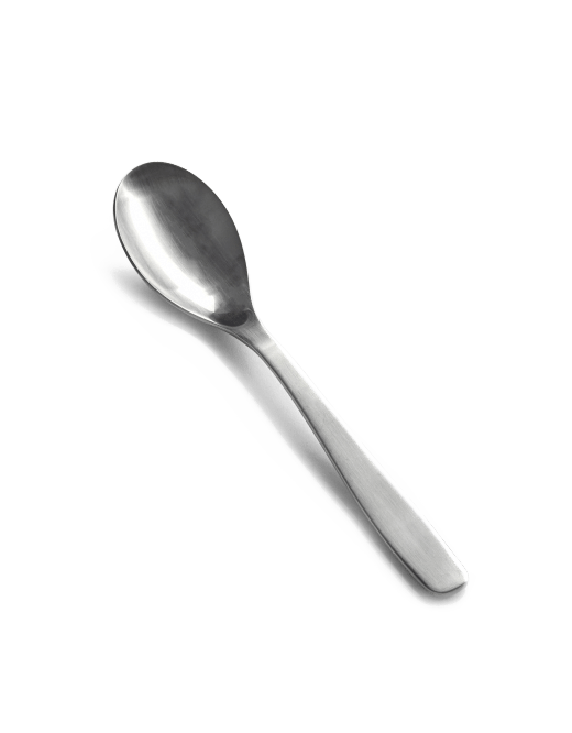 A PASSE-PARTOUT FLATWARE spoon on a blue background.