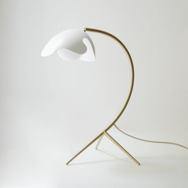 An ATBO PS38 TABLE LAMP adorned with a white flower in the style of Gestalt Haus.
