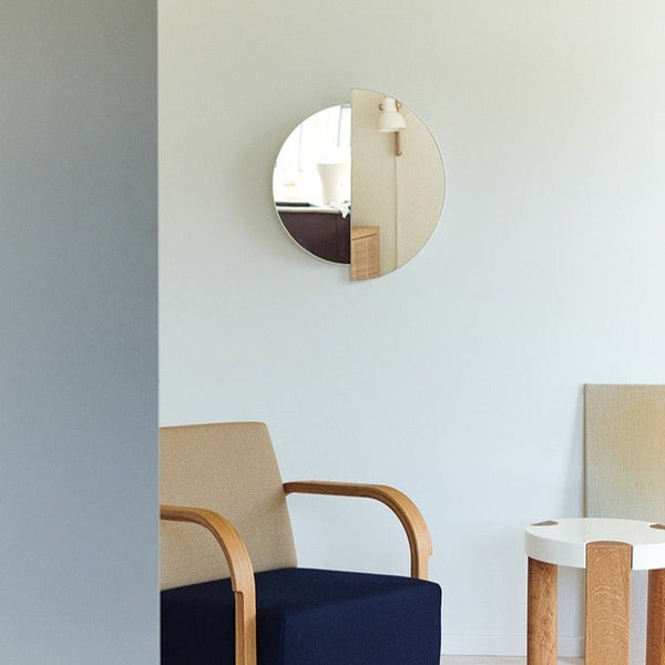 A Gestalt Haus with a Mazo Rae mirror on the wall.
