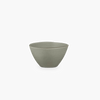 A small STUDIO TABLEWARE bowl on a black background, from the brand KLASSIK STUDIO, showcasing the essence of Gestalt Haus.
