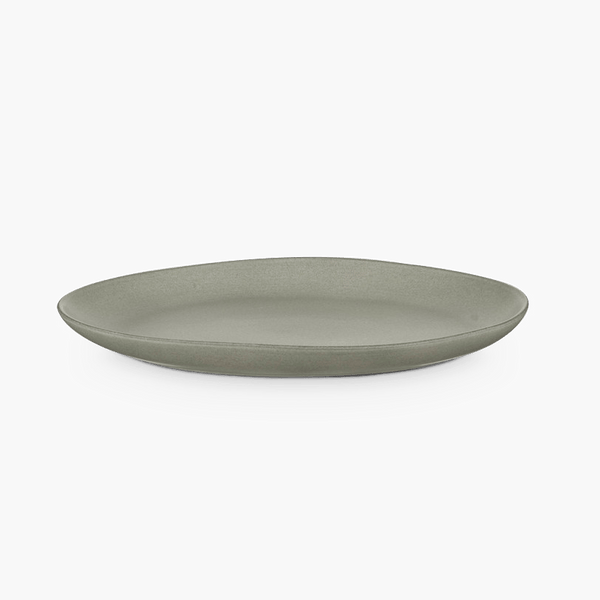 A white plate from KLASSIK STUDIO designed with Gestalt Haus.