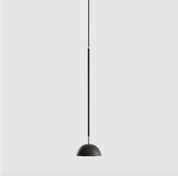 A black and gold pendant light with THE BEAUBIEN SIMPLE SHADE from LAMBERT ET FILS in Gestalt Haus style.