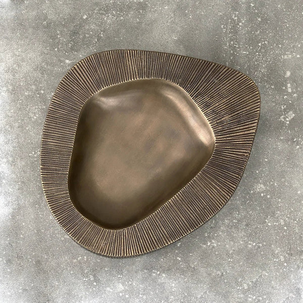 A VALLEY BOWL by BRANDT COLLECTIVE on a concrete floor at Gestalt Haus.