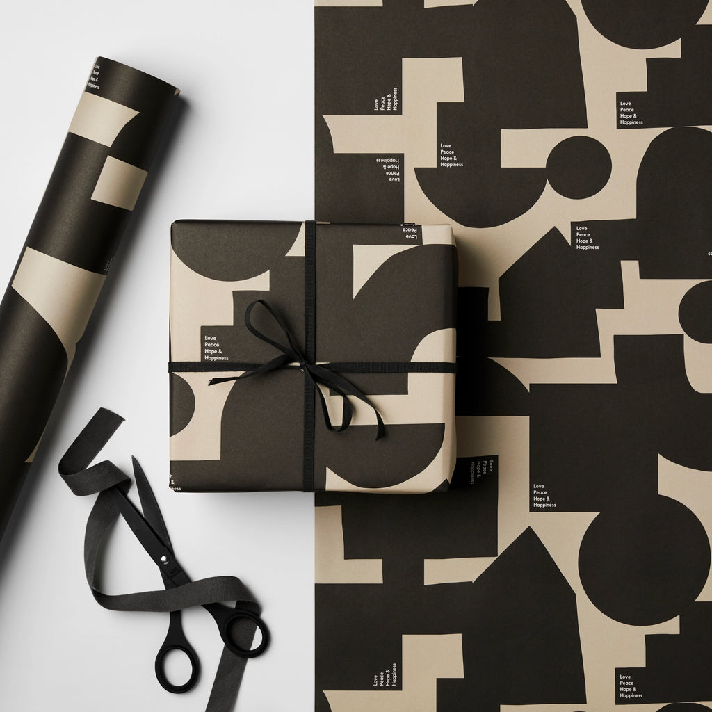 Black and beige Peace, Love, Hope & Happiness gift wrap with geometric shapes by Kinshipped.