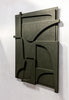 A limited edition PLATEAU 11:36 AM Wall Relief sculpture in natural colors, featuring a black and green design, gracefully hanging on a wall.