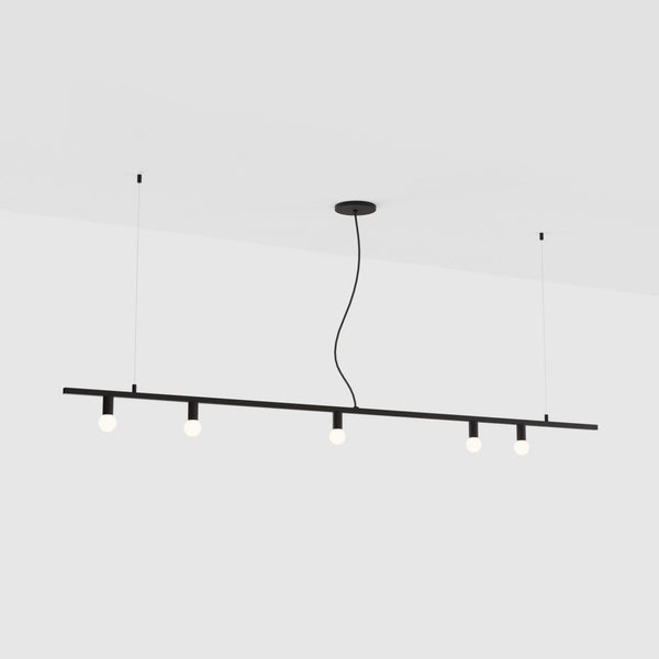 A DOT LINE SUSPENSION pendant light hanging from the ceiling, manufactured by LAMBERT ET FILS.