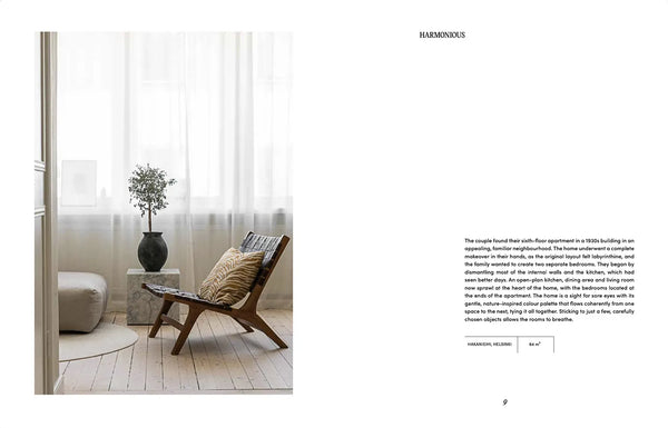 The interior of a room with a COZY SOFT NORDIC chair and a vase.