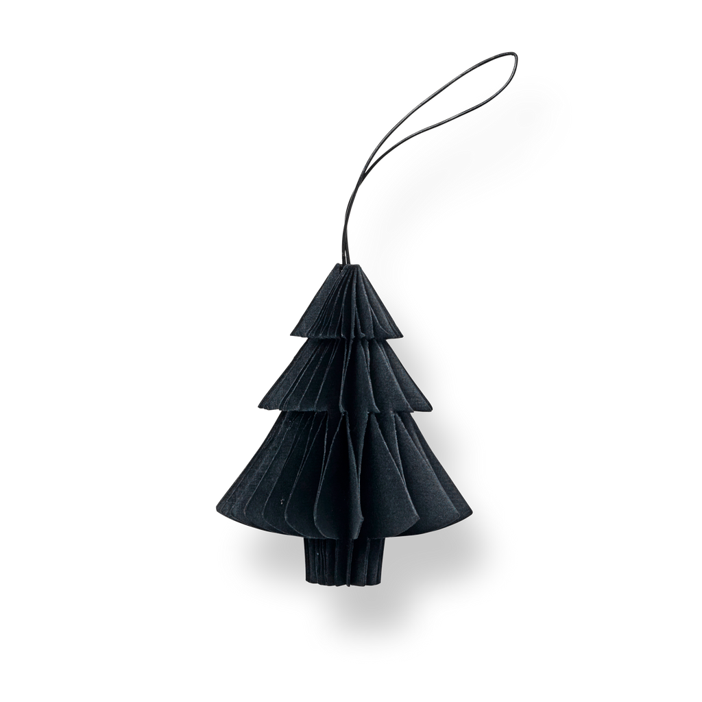 A black holiday ornament hanging on a white background. (Brand: Nordstjerne)