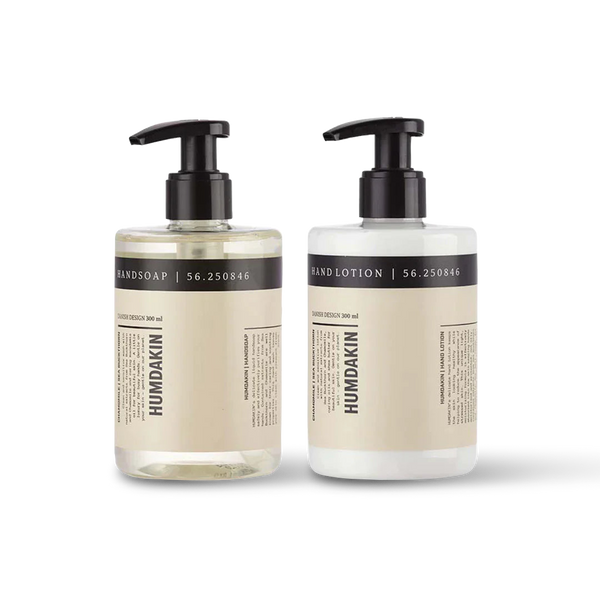 A HUMDAKIN 01 HAND CARE KIT CHAMOMILE + SEA BUCKTHORN (2 PACK) containing two bottles of body wash with a pump, infused with Chamomile and Sea Buckthorn.