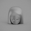 A COINK PIGGY BANK BOOKEND with a face on it, made by STUDIO HENRY WILSON in collaboration with Gestalt Haus.