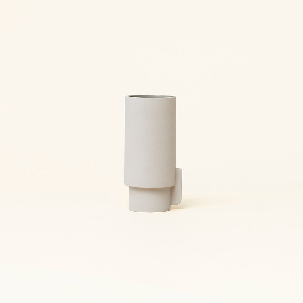 An ALCOA VASE by FORM & REFINE sitting on a Gestalt Haus surface.
