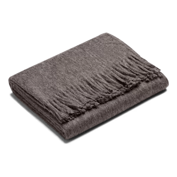 A SIBAST ALPACA THROW with fringes on it inspired by the Gestalt Haus.