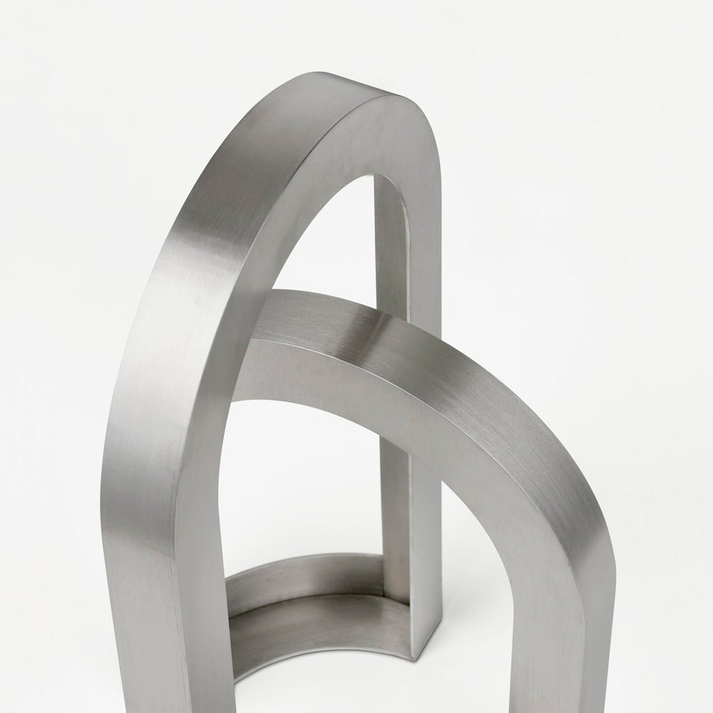 An ARCH SCULPTURE ring from KRISTINA DAM STUDIO displayed on a white background.