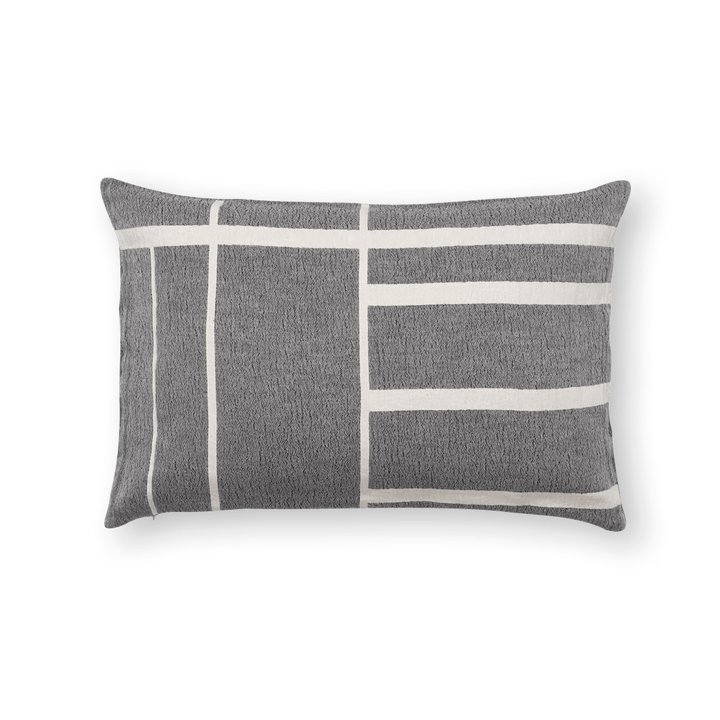An ARCHITECTURE CUSHION by KRISTINA Dam Studio, striped in grey and white.