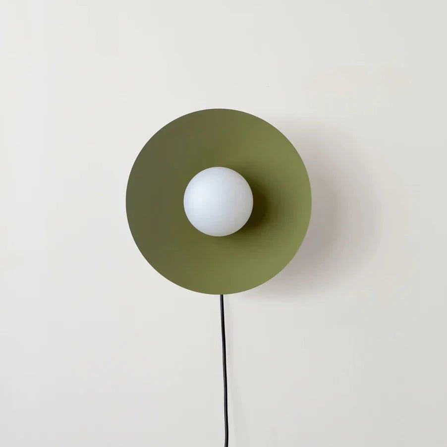 An ARUNDEL ORB SURFACE MOUNT wall lamp on a white wall, in common with Gestalt Haus.