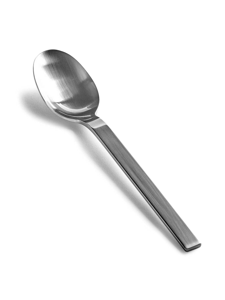 A SERAX spoon on a white background by PIET BOON, featuring BASE FLATWARE.
