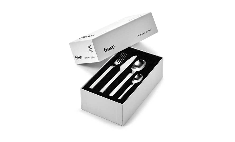 A set of silverware in a white box by SERAX, designed by Piet Boon.