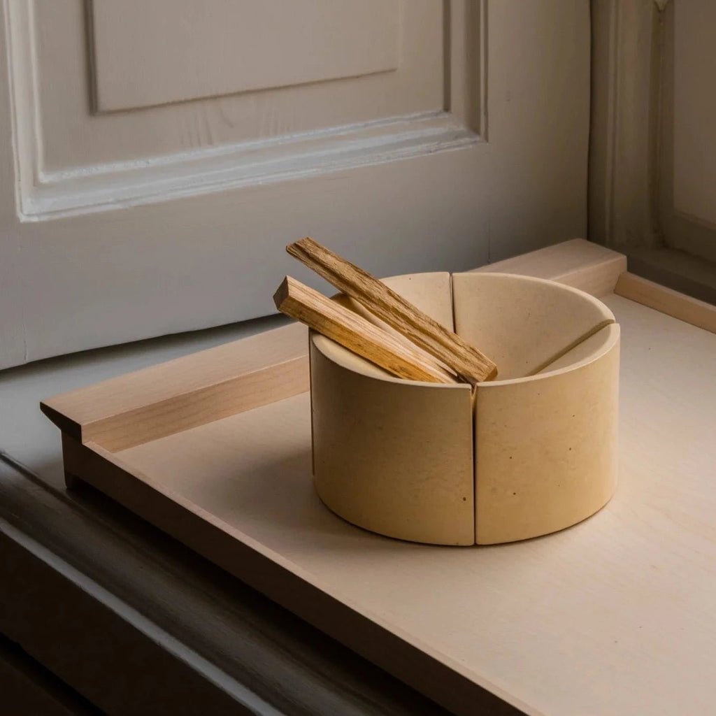 A BRUT SCULPTURES bowl sits on top of a window sill. Brand: ORIGIN MADE.