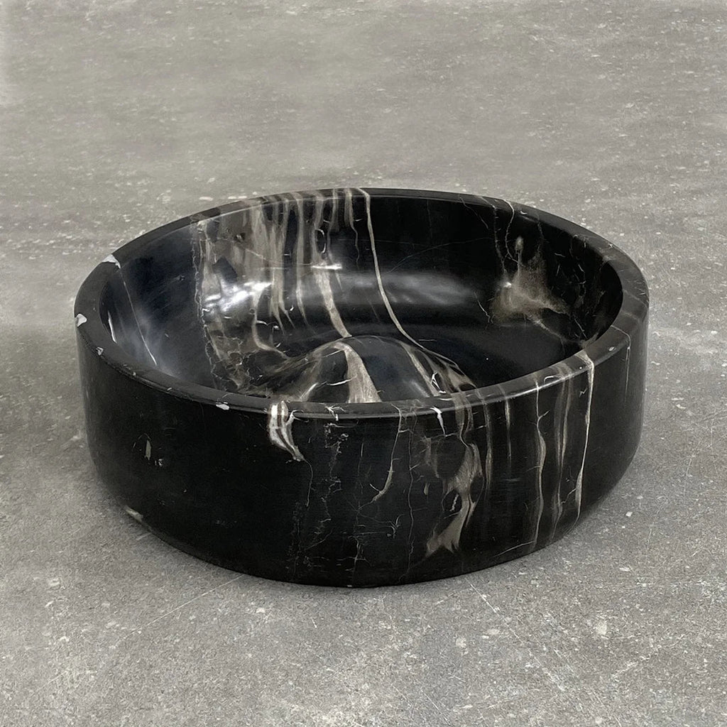 A CIRQUE BOWL sitting on a concrete floor, designed by BRANDT COLLECTIVE at Gestalt Haus.