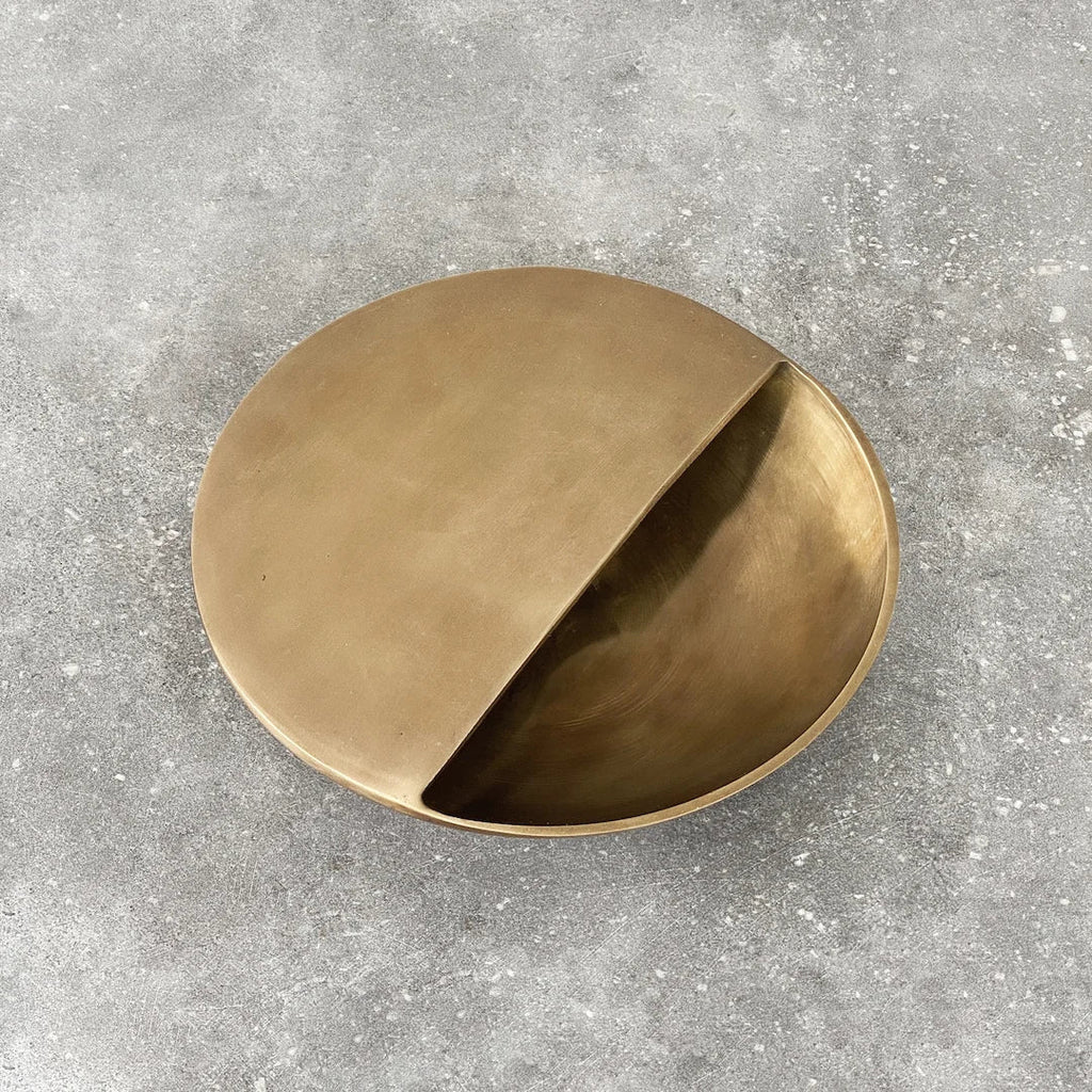 A small COVA BOWL from BRANDT COLLECTIVE on a concrete surface at Gestalt Haus.