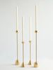 Three Gestalt Haus DOME SPINDLE CANDLE HOLDERS by FS OBJECTS on a white surface.