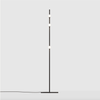 A DOT LINE FLOOR LAMP with a black base and a white light bulb by LAMBERT ET FILS.