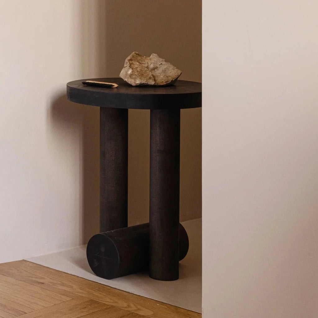 An ÉVORA SIDE TABLE featuring an ORIGIN MADE stone, inspired by the aesthetic of Gestalt Haus.