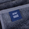 A towel with a label from Gestalt Haus.