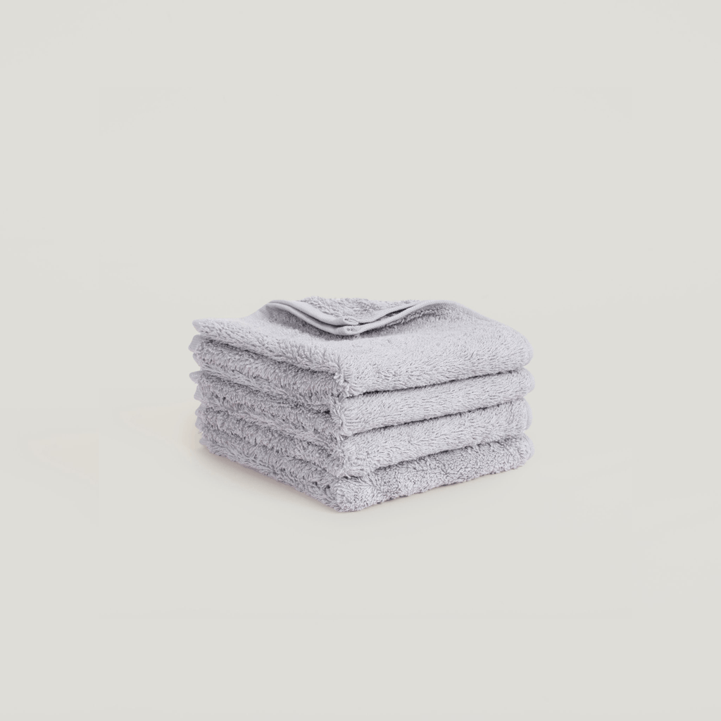 A stack of GESTALT HAUS towels on a white background.
