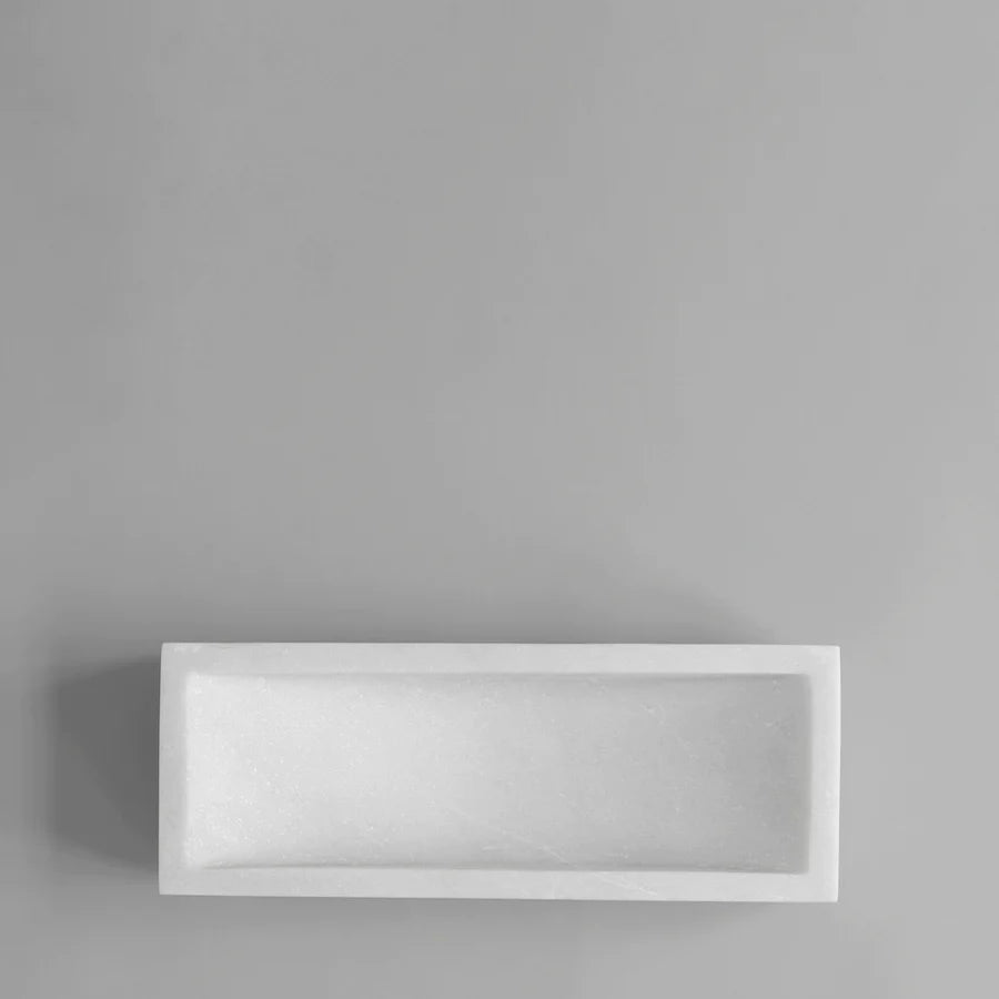 A white rectangular Formalism tray by 101 Copenhagen on a gray wall in a Gestalt Haus.