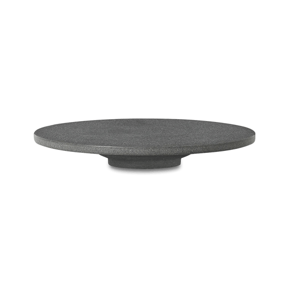 A round black plate on a white background, Louise Roe - Gestalt Haus.