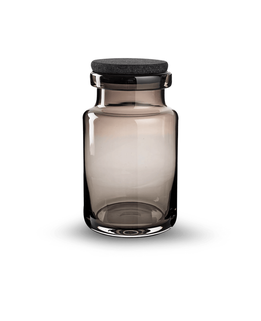 A LOUISE ROE glass jar displayed with a black lid against a black background at Gestalt Haus.
