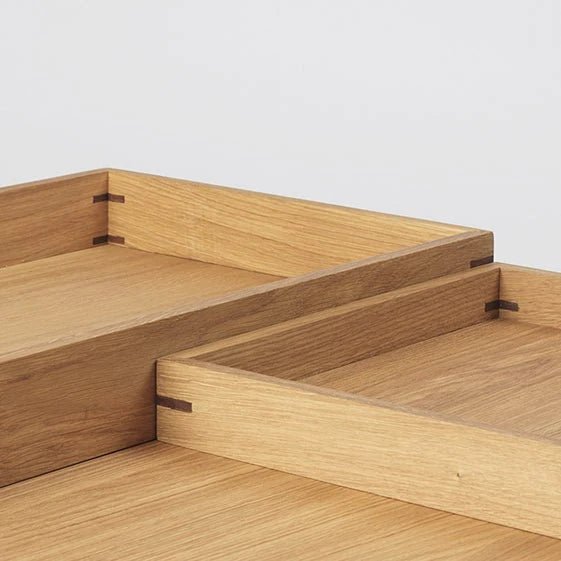 A Kristina Dam Studio wooden box with two drawers atop, combining Gestalt and Haus elements.