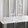 A table featuring the Gestalt Haus set of KRISTINA DAM STUDIO CAPSULE CARAFE + GLASS.