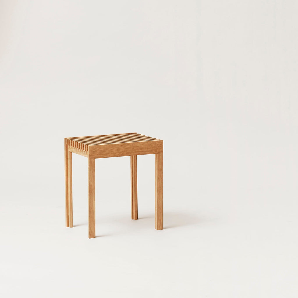 A FORM & REFINE LIGHTWEIGHT STOOL with a white background at Gestalt Haus.