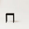 A lightweight FORM & REFINE stool on a white background, called Gestalt Haus.